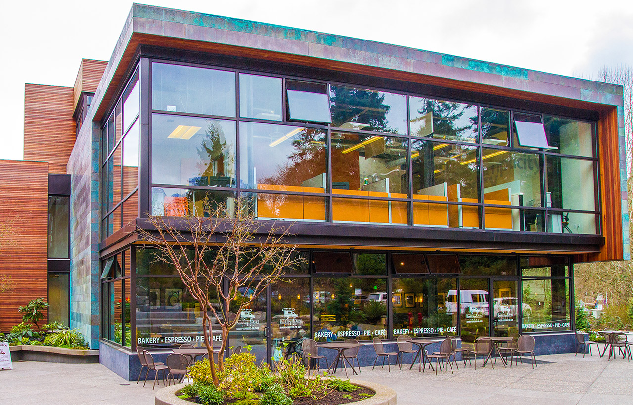 Front elevation view of Eagle Harbor Market Building, designed by a west coast commercial architect firm specializing ins sustainable buildings
