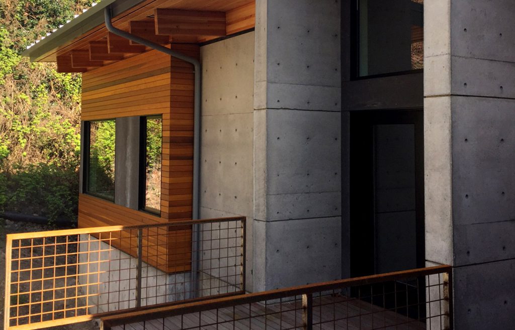 Hillside House, Exterior, Entry. Residential architecture designed by sustainable architect.