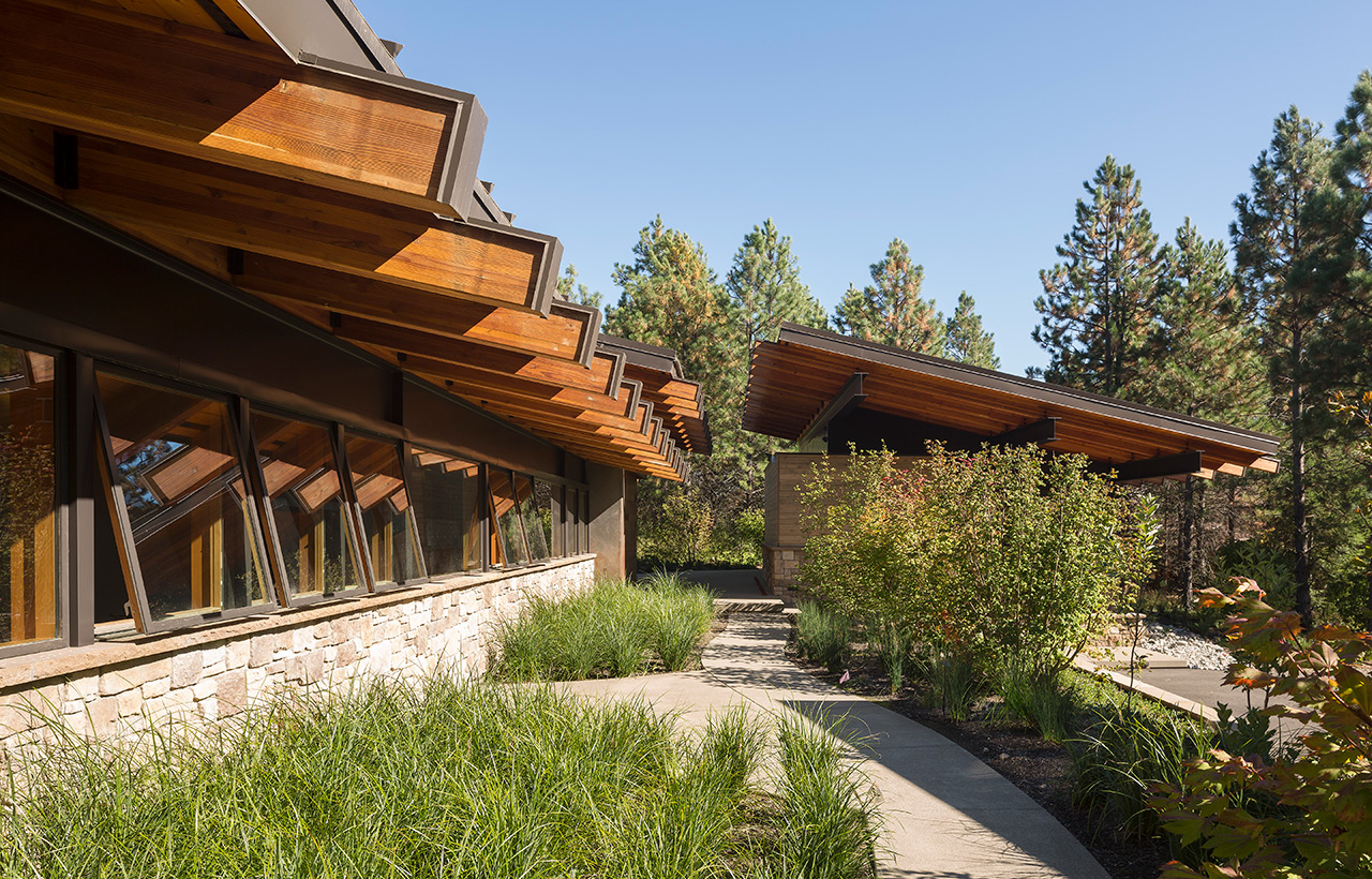 View of exterior walkway and landscaping of Suncadia Resort net zero home by Seattle sustainable architecture firm