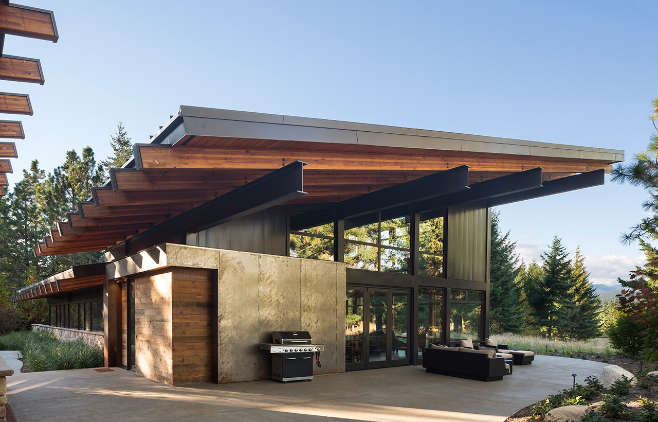 View of patio and side of Suncadia Resort net zero home by Seattle sustainable architecture firm