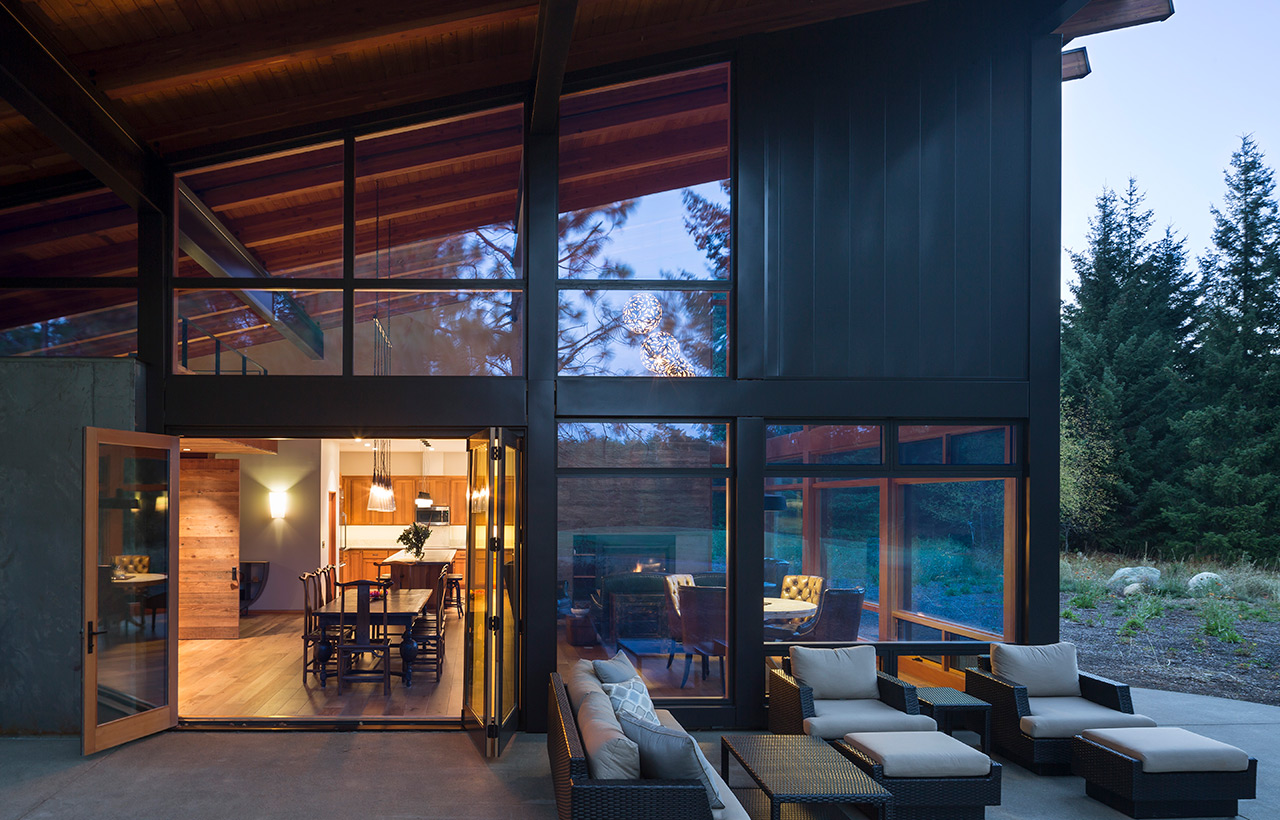Patio view into interior of Suncadia Resort net zero home by Seattle sustainable architecture firm