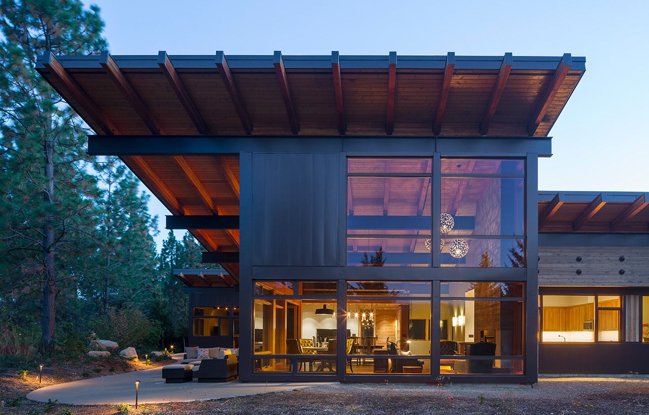 View from exterior into interior of Suncadia Resort net zero home by Seattle sustainable architecture firm